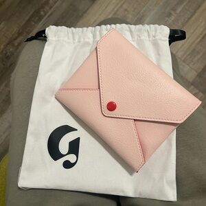 Glossier envelope pouch